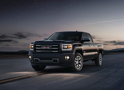 2014 GMC Sierra pickup had projection-beam headlights with LED accent lights. Tight front grille is designed for maximum cooling and better aerodynamics.