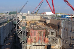 The overall construction process was divided into sections and built in layers rising out of the excavated hole.