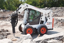 Most manufacturers offer special attachment kits. This Bobcat S570 is equipped with a hydraulic breaker attachment and enclosed cab to protect the operator from debris.