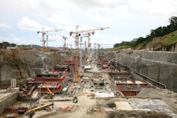 With 164 ft. of height under hook and 164 ft. of jib, the 14 cranes are working 24/7, installing rebar, formwork and machinery to assist in concrete pouring.