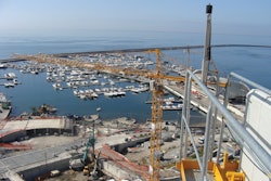 Two of the cranes are working at hook heights of approximately 118 ft. and the third crane operates at a height of approximately 150 ft.