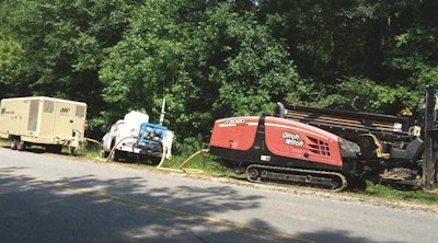 A StraightLine RockEye air hammer system, Ditch Witch JT3020 horizontal directional drill and Sullair air compressor were used to complete a complex bore outside of Ashville, AL.