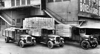 The 1920s saw many innovations in truck design. This early Kenworth fleet illustrates the transition from solid to pneumatic tires and from open to enclosed cabs.