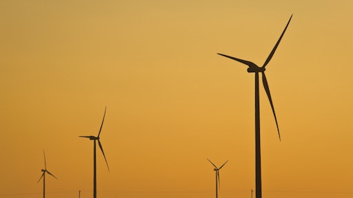 The construction of 15- to 20-ft.-deep concrete foundations to support all of the 328-ft.-high towers with 2-MW turbines required 30,000 tons of cement. On average, each of these below-ground support systems used 60 truckloads of concrete which was poured via a two-step process.