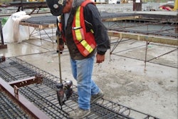 When tying rebar at ground level, using an extension handle on a powered rebar tying tool will help protect against back pain and injury.