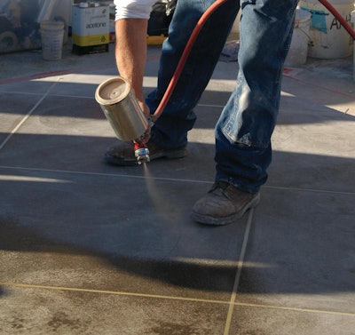 Dye dissolved in acetone solvent is being applied. Acetone is an especially risky solvent to use because of the risk it poses for fire and explosion. That said, it does a great job with dye stain applications and dries almost instantly.