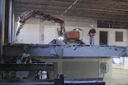 Husqvarna is moving in the direction of selling robots to demolish concrete, separating workers from exposure to vibration issues. Workers stand away from the machine and use joysticks to control the robot's movement.