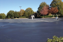 Owner Gerry Signs says that despite the weather the crews were able to complete sealcoating areas quickly enough so there was enough time for the sealer to dry between coats.