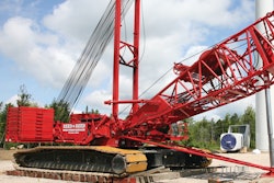 The Boom Raising System utilizes a large hydraulic cylinder housed in a special 10-ft. boom insert section that attaches to the boom butt. The boom raising cylinder works in conjunction with the boom hoist by exerting an upward force on the boom.