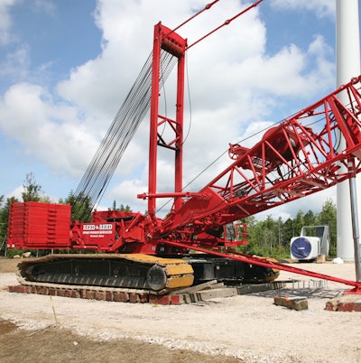 The Boom Raising System utilizes a large hydraulic cylinder housed in a special 10-ft. boom insert section that attaches to the boom butt. The boom raising cylinder works in conjunction with the boom hoist by exerting an upward force on the boom.