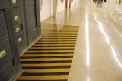 Yezco worked with its dye supplier, Ameripolish, to create safety designation designs they could integrated into the polished concrete floors throughout the hangars. Ameripolish’s standard black, yellow, red and green colors were compatible with safety standards for color work in these applications.