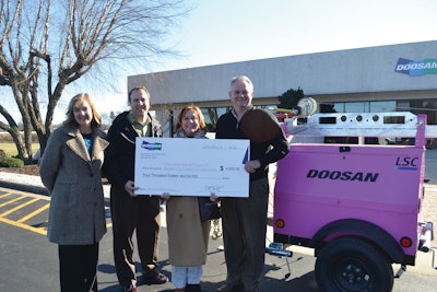 From left to right: Deree Bivins, marketing manager, Doosan Portable Power; Dave Stahlman, vice president of global marketing, Doosan Portable Power; Jane Cacchione, former Race for the Cure director, Susan G. Komen, Charlotte Affiliate; Shawn Sweet, president, Doosan Portable Power