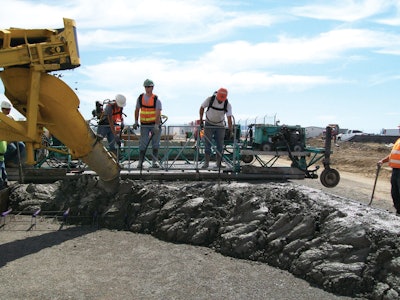At the Spokane International Airport, Wm. Winkler Co. go a slipform specification changed to allow placement with a Multiquip SuperScreed, which contributed to quality and schedule benefits on the project.