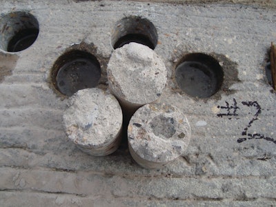 In-place concrete strengths represented by cores are typically less than lab-cured cylinder strengths due to field factors like consolidation and curing.