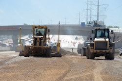 In building the road, the contractor first laid an average of 1 ft. of select granular borrow or crushed stone aggregate then a half of a foot of smaller, open graded base was placed on top.
