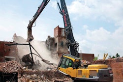The Volvo EC360C High-Reach excavator had a 69-ft. boom with a multi-processor that crunched the concrete and brick structure with the front part of the jaws and cut through metal in the rear of the jaws.