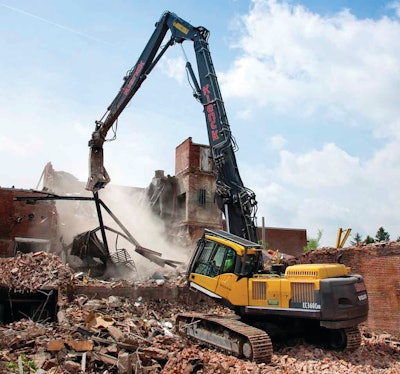 The Volvo EC360C High-Reach excavator had a 69-ft. boom with a multi-processor that crunched the concrete and brick structure with the front part of the jaws and cut through metal in the rear of the jaws.