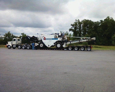 Lane Construction needed a trailer that would efficiently get its Roadtec Shuttle Buggy to the jobsite without hassle while meeting road regulations.