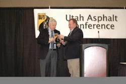 Don Brock accepts award from Utah Asphalt Pavement Association