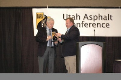 Don Brock accepts award from Utah Asphalt Pavement Association