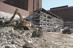 Strict vibration restrictions were a main challenge during demolition of a 5-story parking garage attached to a functioning hospital.