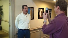 Doug Herbert records a video testimonial from a customer.