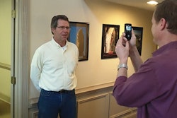 Doug Herbert records a video testimonial from a customer.