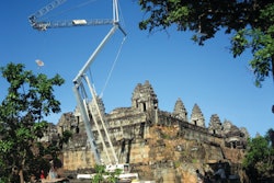 A Terex CBR 24 Plus self-erecting tower crane is lifting stone blocks and other materials up to a maximum of two tons or up to its maximum radius of 78 feet.