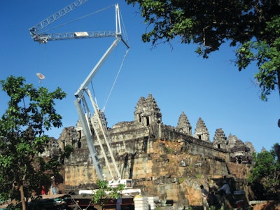 A Terex CBR 24 Plus self-erecting tower crane is lifting stone blocks and other materials up to a maximum of two tons or up to its maximum radius of 78 feet.