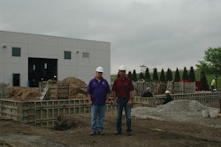 Scott and Dave Martinson, owners of Martinson Construction, on site at a project in Waterloo, Iowa, where their company is installing footings and a foundation for a car dealership addition.