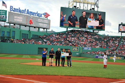 Mike Musto, (right), CEO of U.S. Pavement Services, presents a $10,000 donation to the Wounded Warrior Project at a June 8 even at Boston’s Fenway Park. From left are Linda Perry, Wounded Warrior Project Warrior Outreach Coordinator; Craig Hall, Army Retired SPC; Andrew Musto, COO, U.S. Pavement Services; Margaret Musto (wife of Mike Musto); Mike Musto, CEO, U.S. Pavement Services.