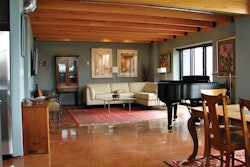 A previous contractor left deep scratches in the floor on a failed concrete polishing attempt. Surface Tech performed a complete re-work on the floors to achieve the look the owner desired.