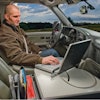 The Road Master Truck Mobile Office from Mobile Desk is secured to the passenger seat by using the seat belt. It is designed for people working out of their vehicle that predominately use a laptop.