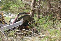 Scott Wolf uses a Bradco Ground Shark Extreme-Duty brush cutter (such as the one shown) to clear trails through 700 acres of heavy hardwoods in Muenster, TX.