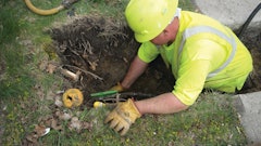 Brandon Nolder of M. O'Herron Co. tests a prototype Hole Hammer with a standard replaceable head.