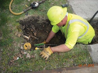 Brandon Nolder of M. O'Herron Co. tests a prototype Hole Hammer with a standard replaceable head.