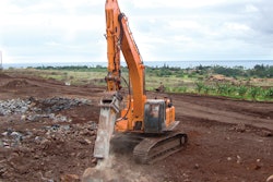 Blasting was not called for in the bid specs. Excavators equipped with rippers and hammers got the job done.