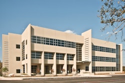 The Killiam office building used a new tilt-up concrete design to incorporate a continuous band of windows.