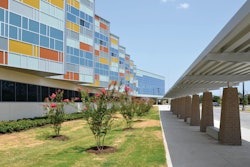 The outside facade of the Billy Earl Dade Middle School in Dallas, Texas, which opened on time and under budget thanks in part to a new rapid-drying concrete technology.