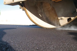 Compaction of a fine-graded asphalt pavement, one of several pavement types addressed in The World Road Association's Quiet Pavement Technologies report.