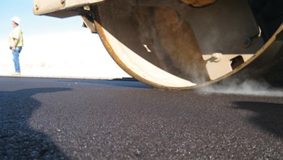 Compaction of a fine-graded asphalt pavement, one of several pavement types addressed in The World Road Association's Quiet Pavement Technologies report.