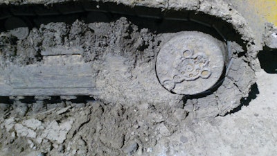 Properly cleaning the track prevents packing, which increases track tension.