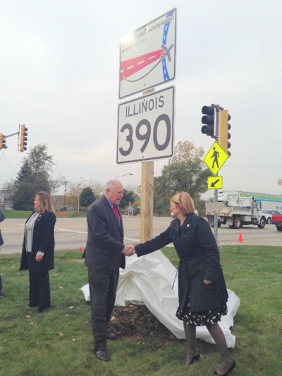 A sign displaying the new name of the Elgin-O'Hare Expressway, Illinois Route 390, was unveiled after the official ground-breaking ceremony. (Pictured from left: Illinois Tollway Executive Director Kristi Lafleur, Governor Pat Quinn, and IDOT Transportation Secretary Ann Schneider.)