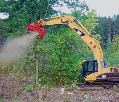 Bob Ray Company used a Caterpillar 336 excavator with a Fecon BH80 mulcher head to remove underbrush and volunteer trees up to 12 to 14 in. in diameter along the Watterson Expressway.