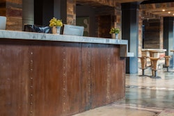 The owner of the Paper Factory Hotel chose concrete for his newly renovated building for its look and low life cycle costs.