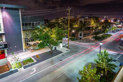 Bagby Street comes alive with an active nightlife, complimented by lighting along all paths and within benches.