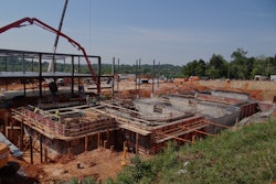 The Knoxville-based proton therapy facility contains approximately 15,000 cubic yards of concrete and was constructed on an 18-inch-thick mat foundation, with walls ranging in thickness from 3 to 12 feet.