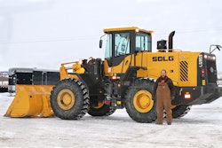 Cole Koch, superintendent and part-owner of Double K Excavating, in front of the company's new LG959, the first SDLG machine sold in North America.