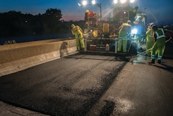 The total job required 75,000 tons of E10 Superpave HMA to be laid 3 ½ inches thick and compacted to 92 percent. Paving widths varied from 12 to 16 feet depending on whether it was lane, shoulder or places where lanes merged.