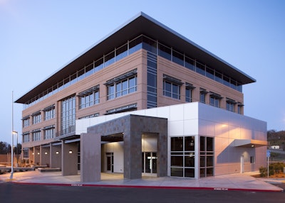 To meet the demands of the architect and the developer for the Business Park, Special Reinforced Concrete Moment Frames were chosen to function as both the exterior skin as well as the Lateral Force Resisting System.